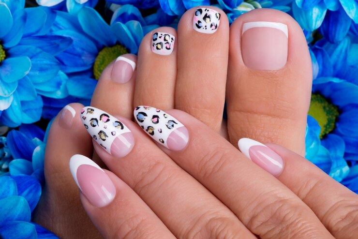 beautiful woman s nails hands legs with beautiful french manicure art design_186202 6674